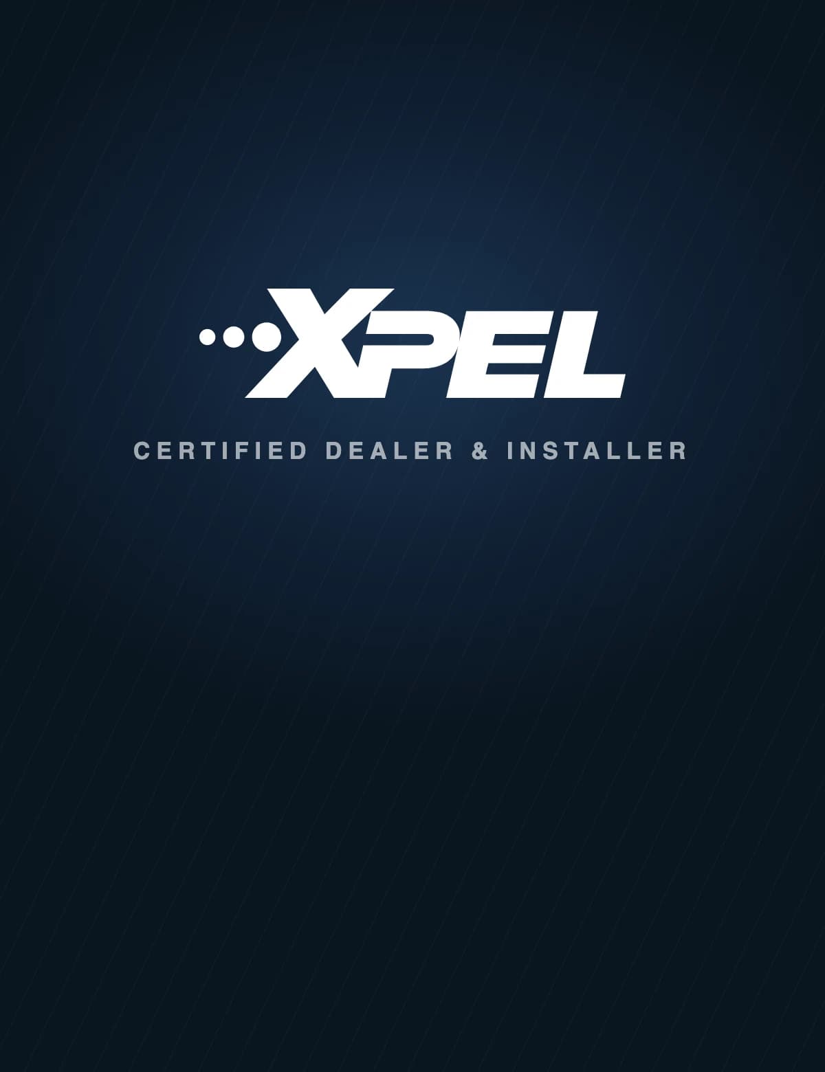 Certified installer applying film carefully to architectural glass