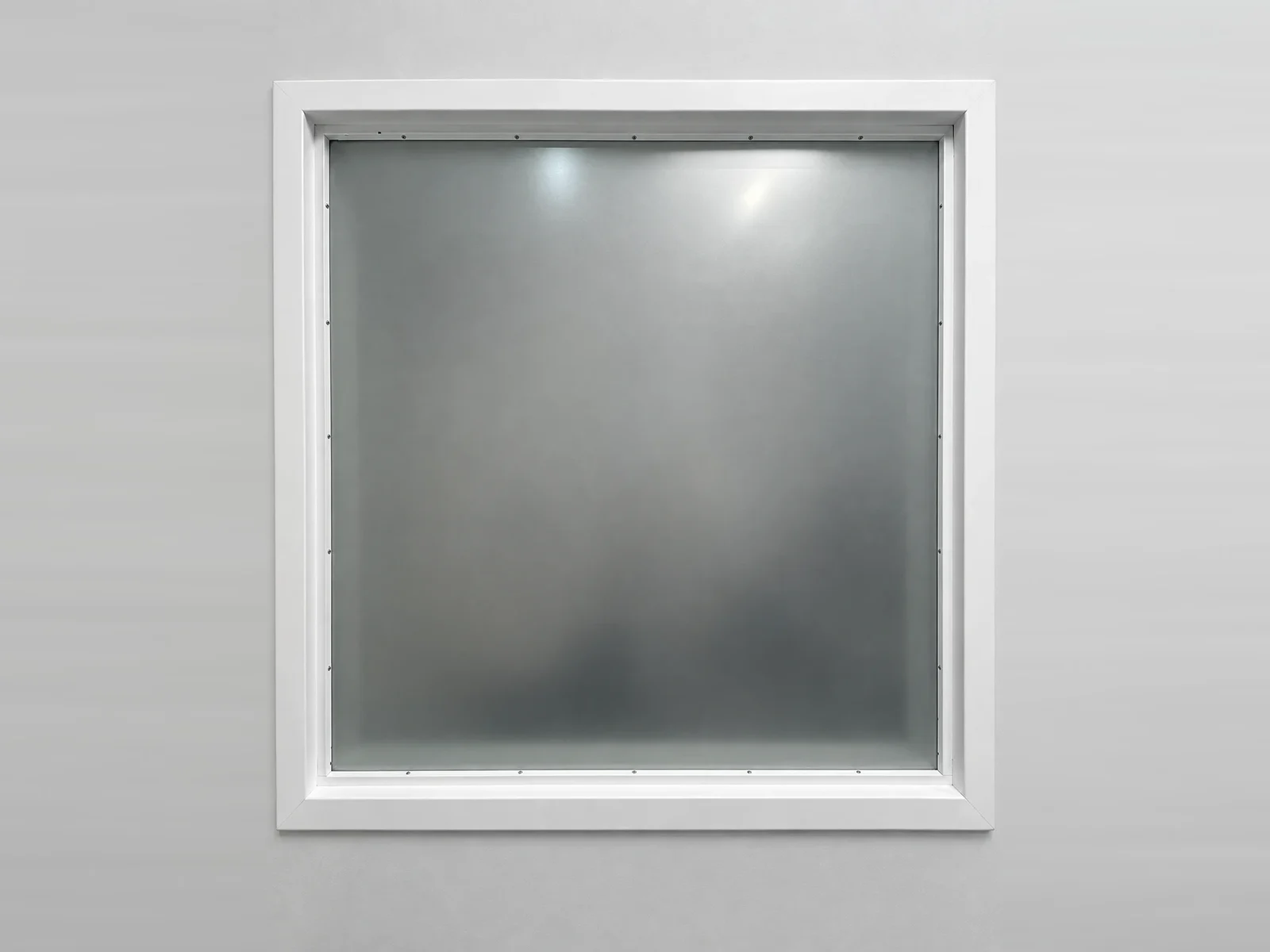 Fully frosted interior window within a white frame